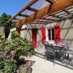 Terrasse couverte avec barbecue